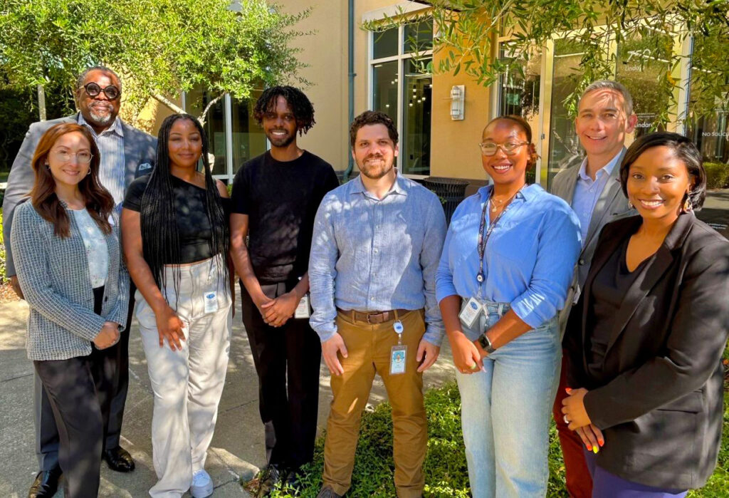 A group of BioMarin employees and fellows standing outside at the company's headquarters