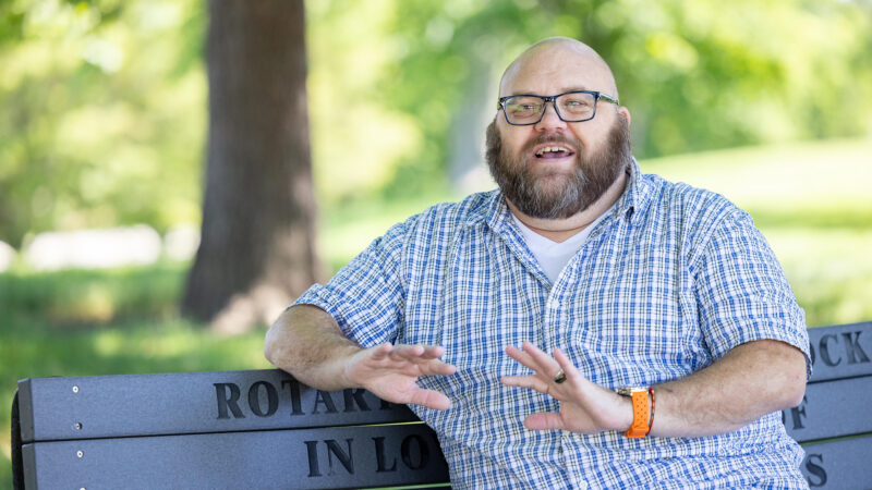 Jonathan Springborn sitting on a park bench.