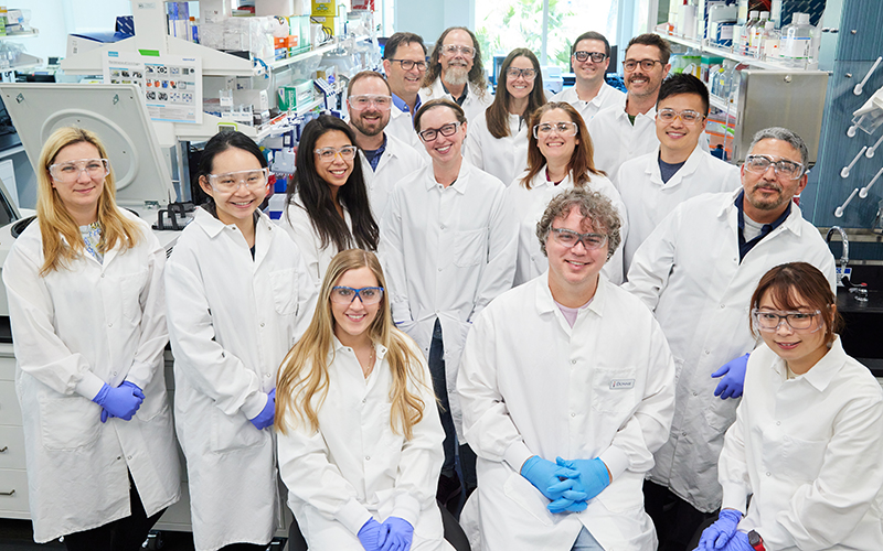 A large group of BioMarin scientists in a lab